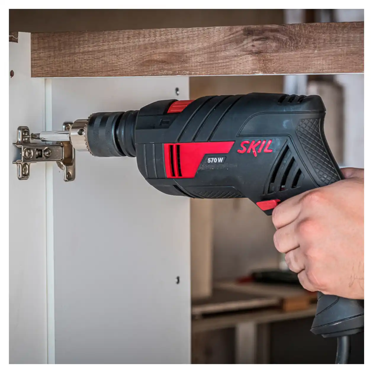 Taladro Percutor 1/2" (13mm) 570W Vel. Variable + 14 Brocas SKIL 6555 - Imagen 5