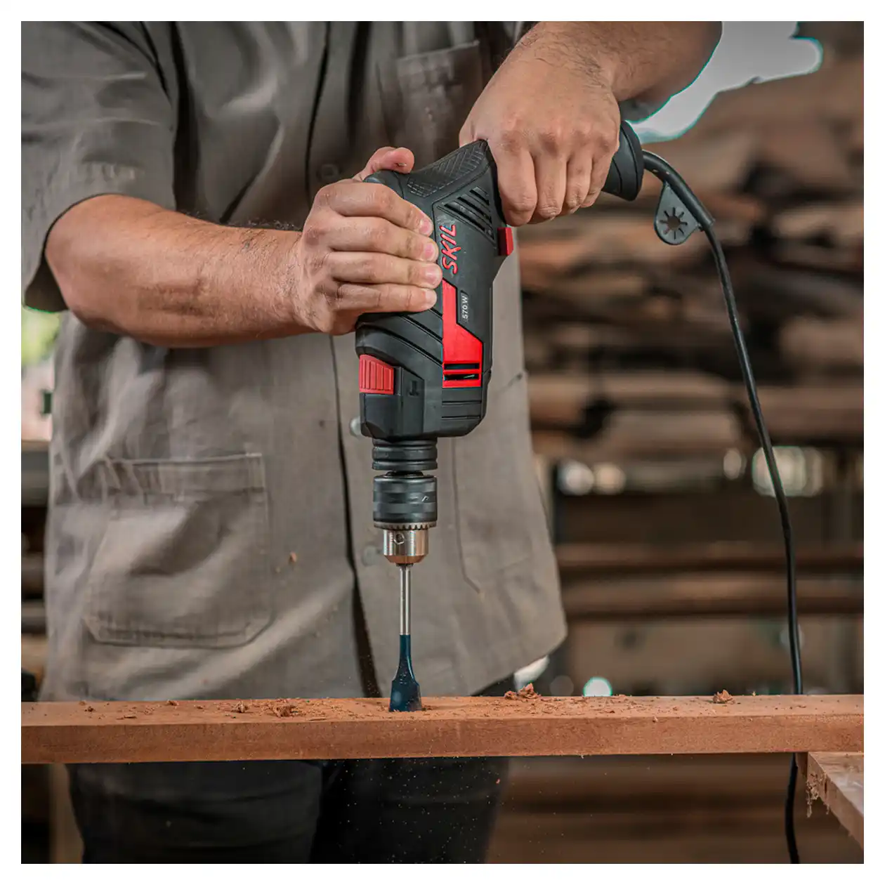 Taladro Percutor 1/2" (13mm) 570W Vel. Variable + 14 Brocas SKIL 6555 - Imagen 7