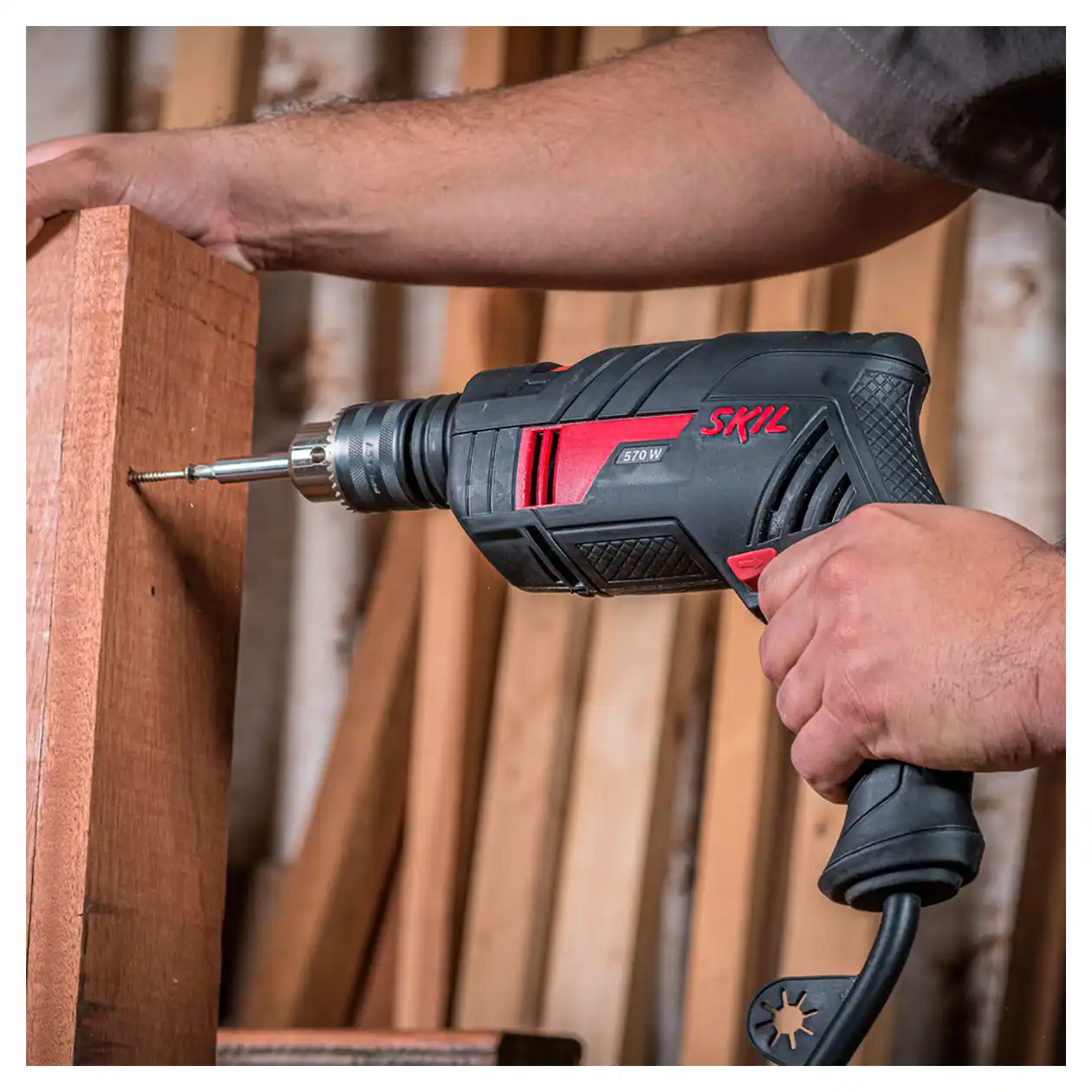 Taladro Percutor 1/2" (13mm) 570W Vel. Variable + 14 Brocas SKIL 6555 - Imagen 8