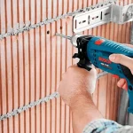Taladro Percutor 1/2" 650W BOSCH GSB 13 RE + Set de 23 piezas - Imagen 3