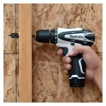 Taladro Percutor HP330DWE + Sierra Caladora 12V JV100DW + Maleta MAKITA DK1496WX - Imagen 5